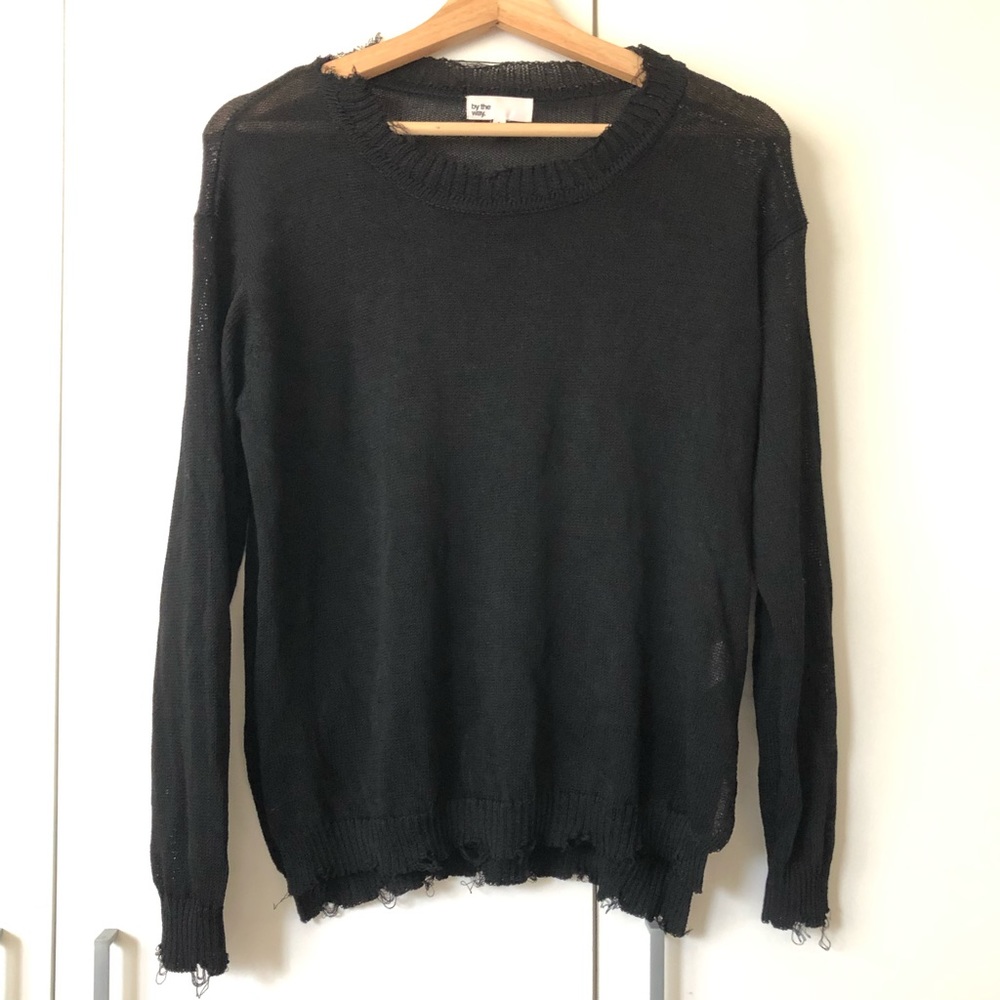 by the way. Destroyed sweater